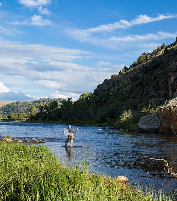 man fly fishing